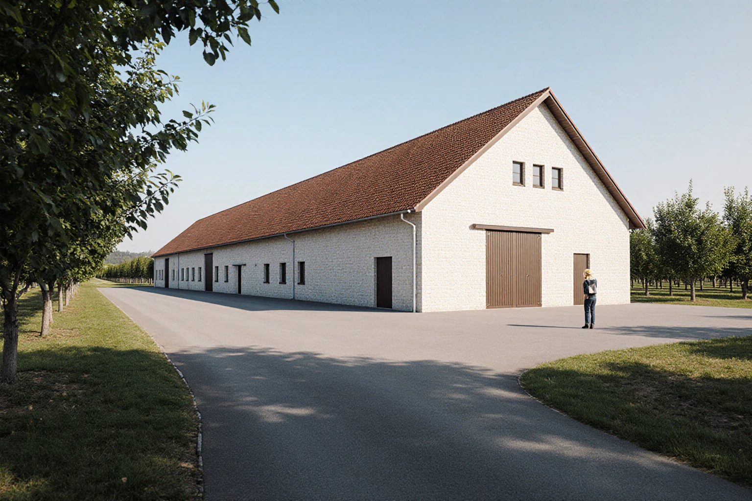 Storage hall beside rows of fruit trees